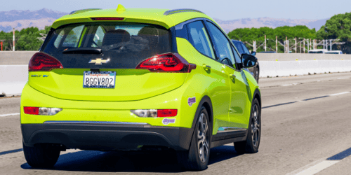 A Chevrolet Bolt on a highway