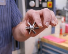 Machinist Showing Tool