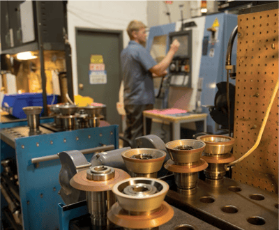 Machined parts about to be put into a machine